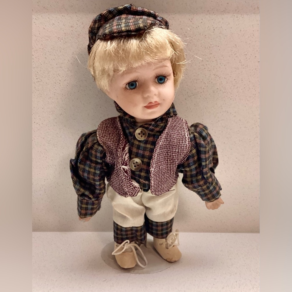 Old vintage 9” porcelain Dutch Boy Doll w\ original clothing Cathay Collection